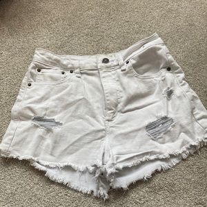 white distressed jean shorts. high rise